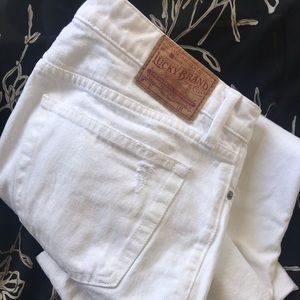 White frayed straight leg jeans